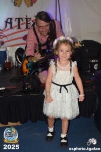 Child with flower crown at Oktoberfest Miami 2025.