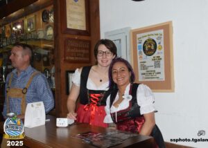 Oktoberfest Miami bartenders in traditional attire, 2025.