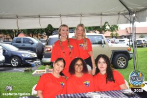 Group at Oktoberfest Miami under event tent