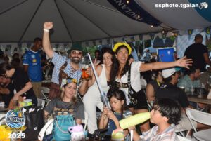 Group celebrating at Oktoberfest Miami 2025 event.