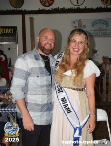 Couple smiling at Oktoberfest Miami 2025 event.