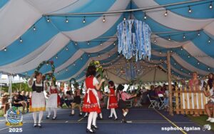 Oktoberfest celebration with dancers in traditional dress