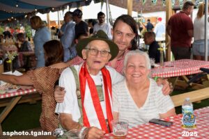 Smiling group at Oktoberfest Miami celebration.